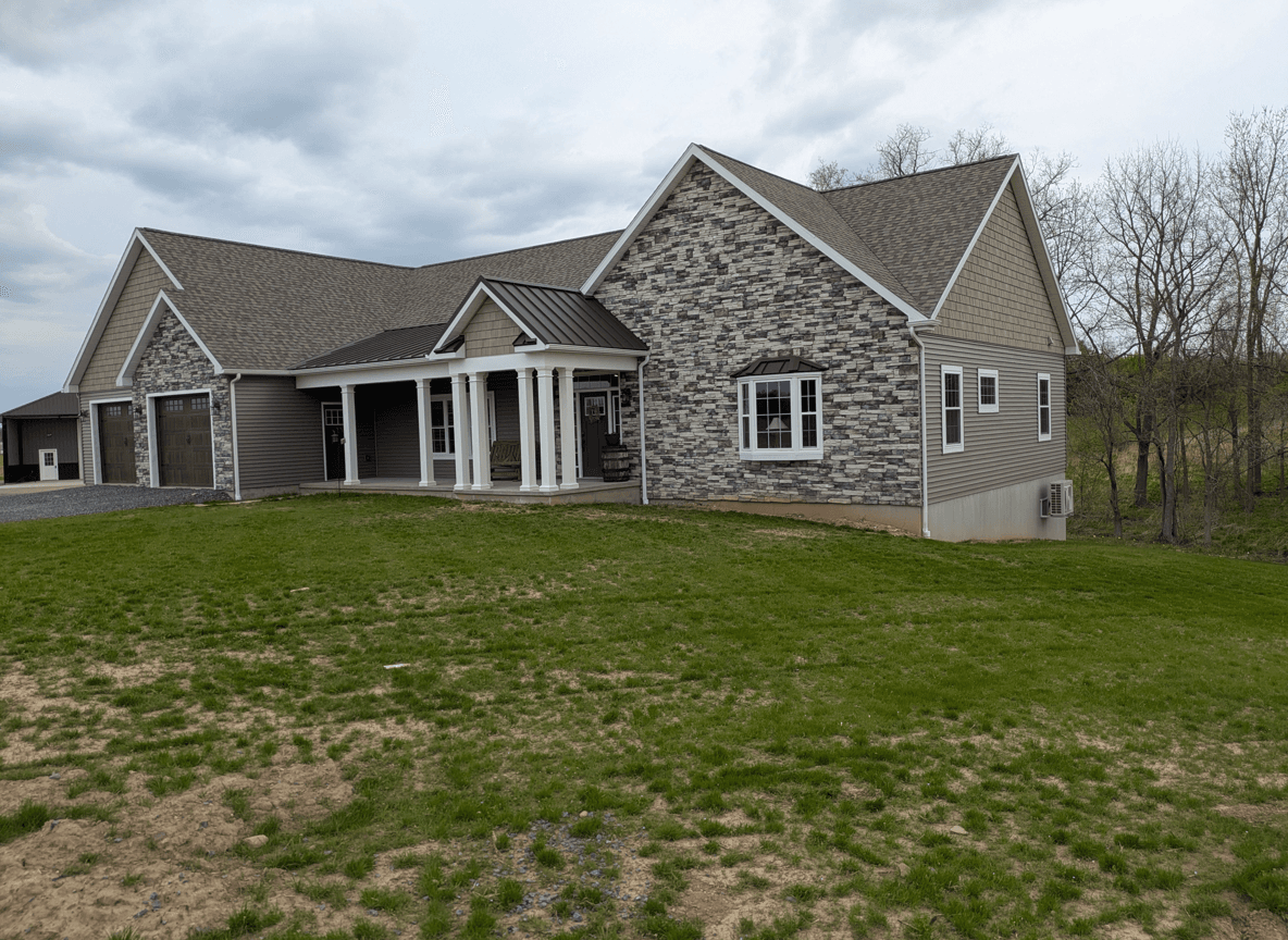 View of a house with a porch and window, asking about tree placement.