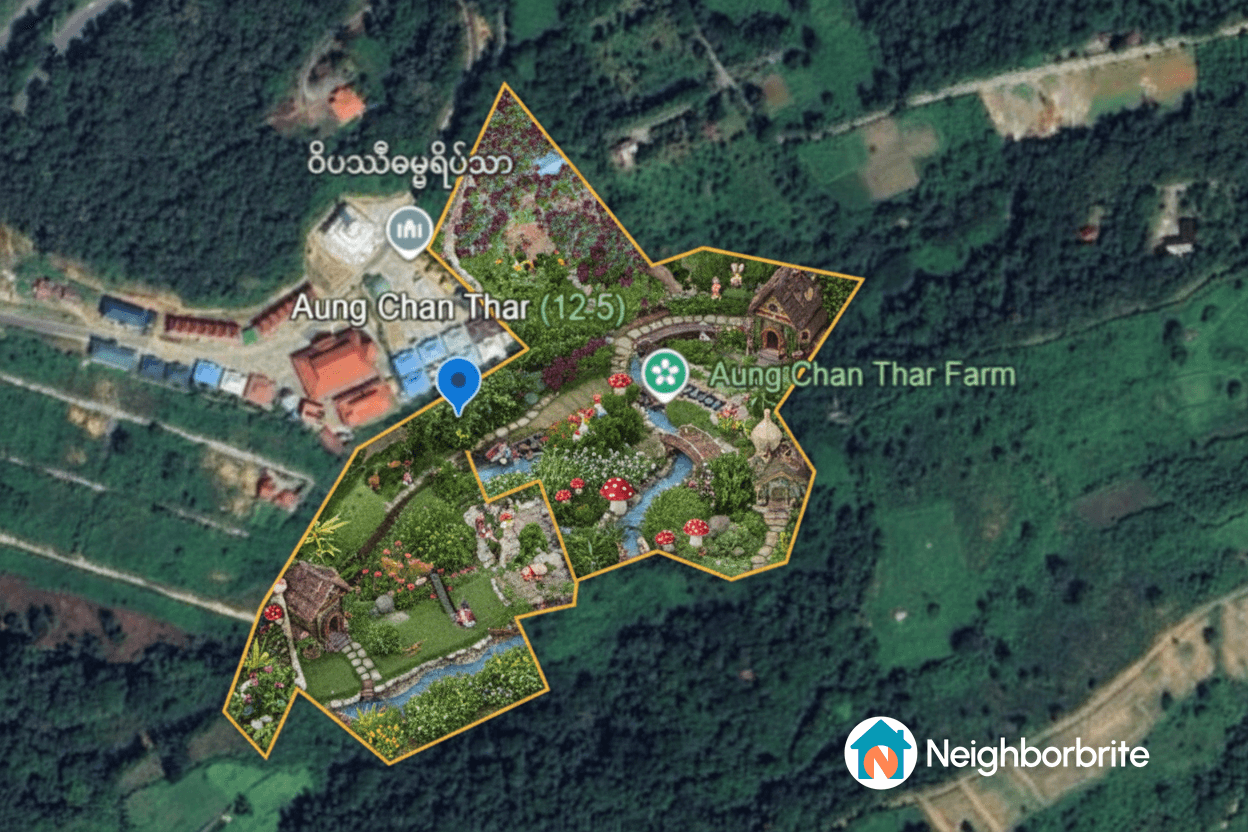 Aerial view of a landscaped area with gardens and pathways.