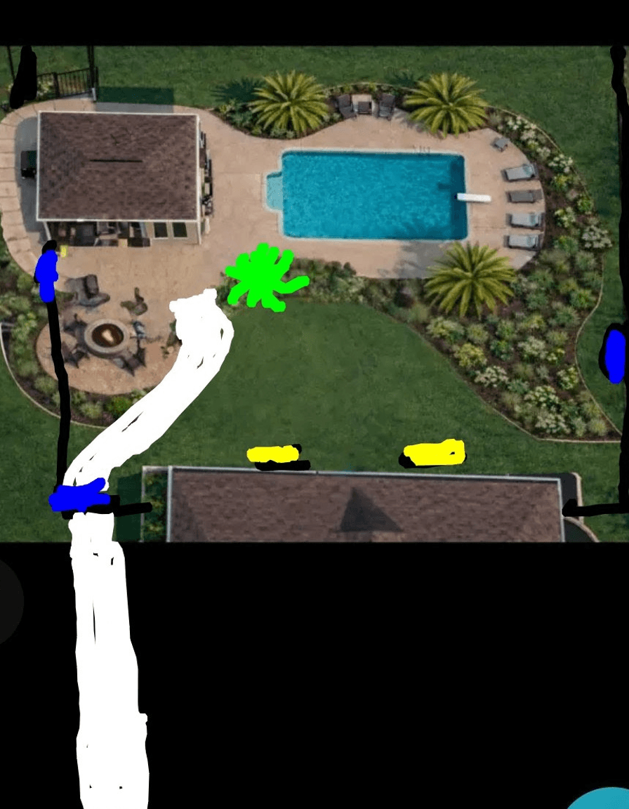Aerial view of backyard layout with pool, concrete, and pathways marked.