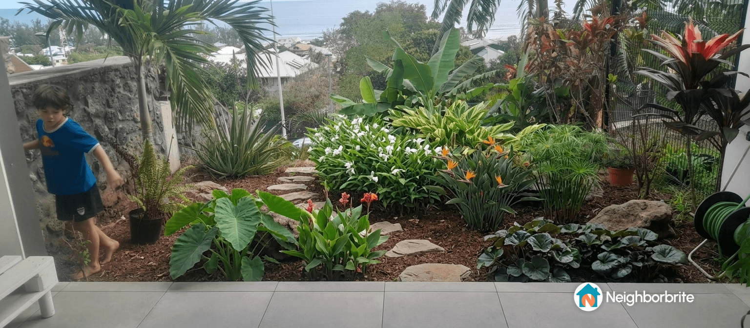 A vibrant landscaped garden with various plants and a child playing.