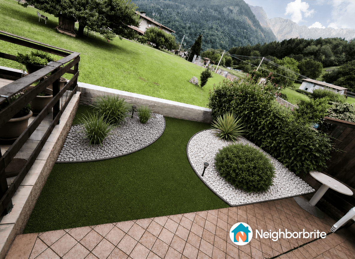 A landscaped yard with gravel, grass, and plants, seeking design suggestions.
