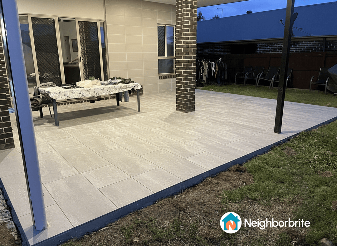 Outdoor area featuring wood look tiles on the ground.