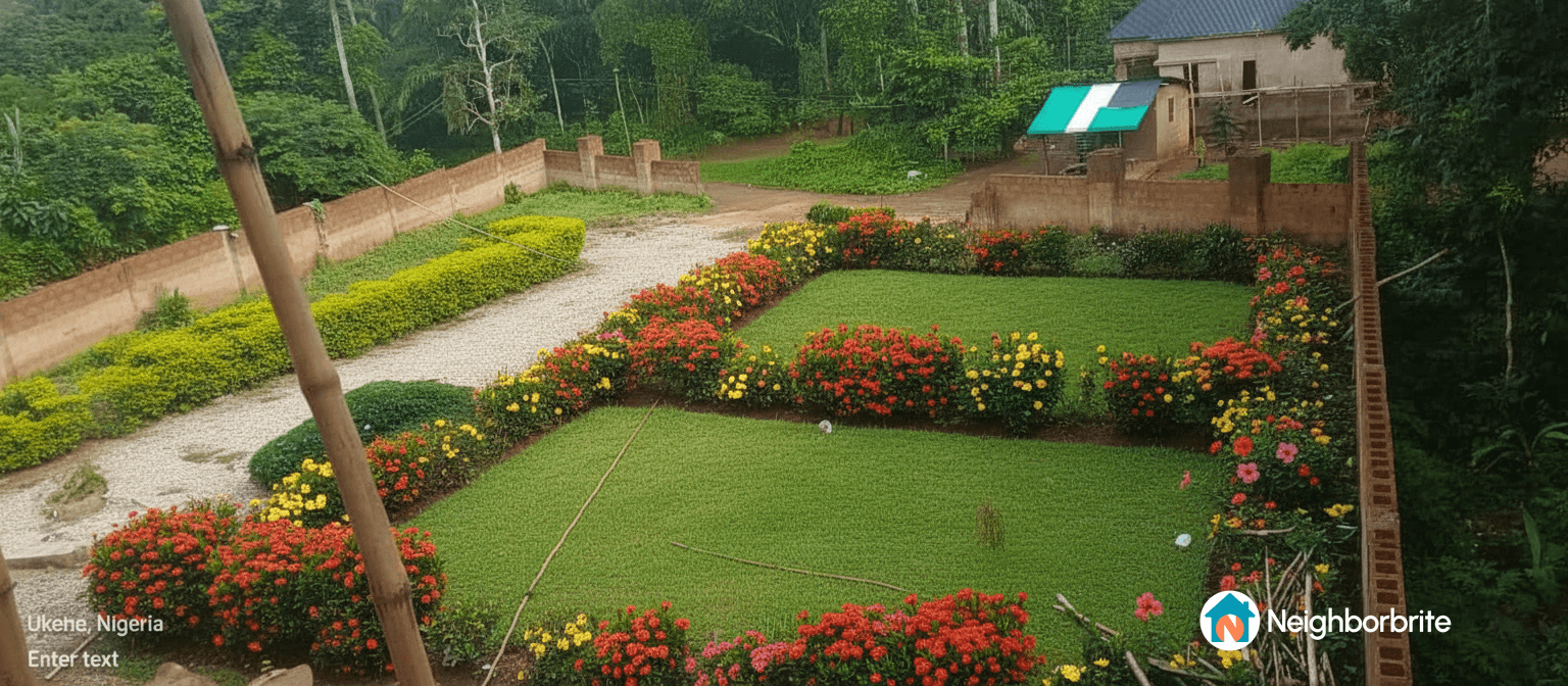 A vibrant garden with colorful flowers and green grass in Ukehe, Nigeria.