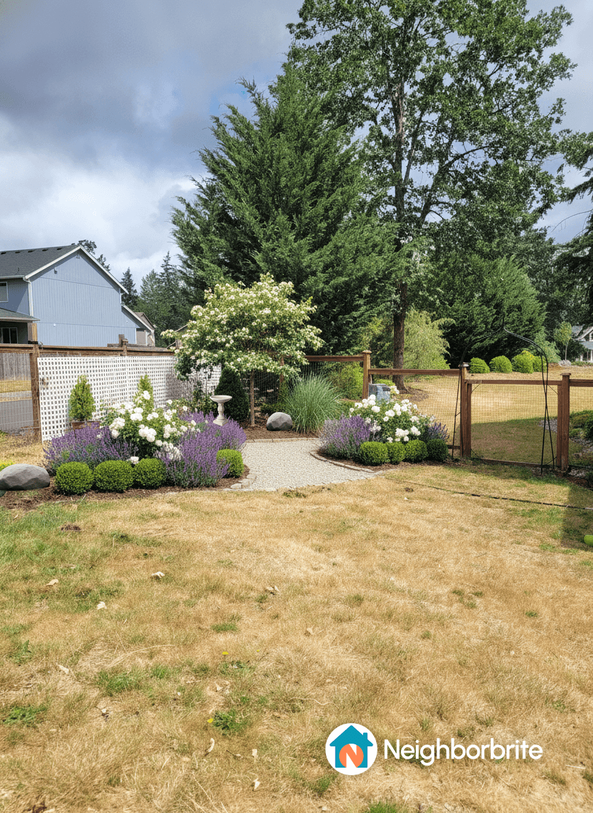 A landscaped yard with flowers and a tree, asking for tree suggestions.