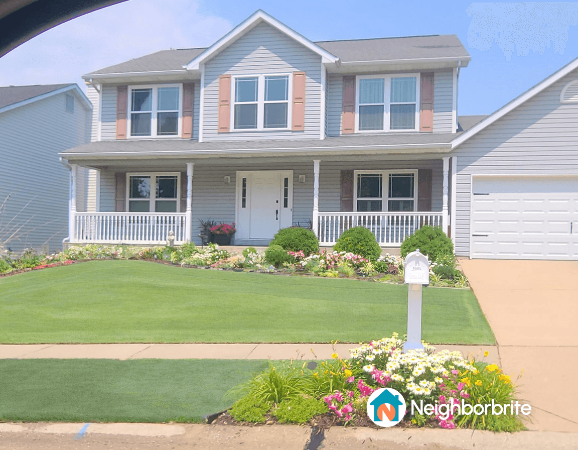 A house with a front yard, seeking landscape design ideas.