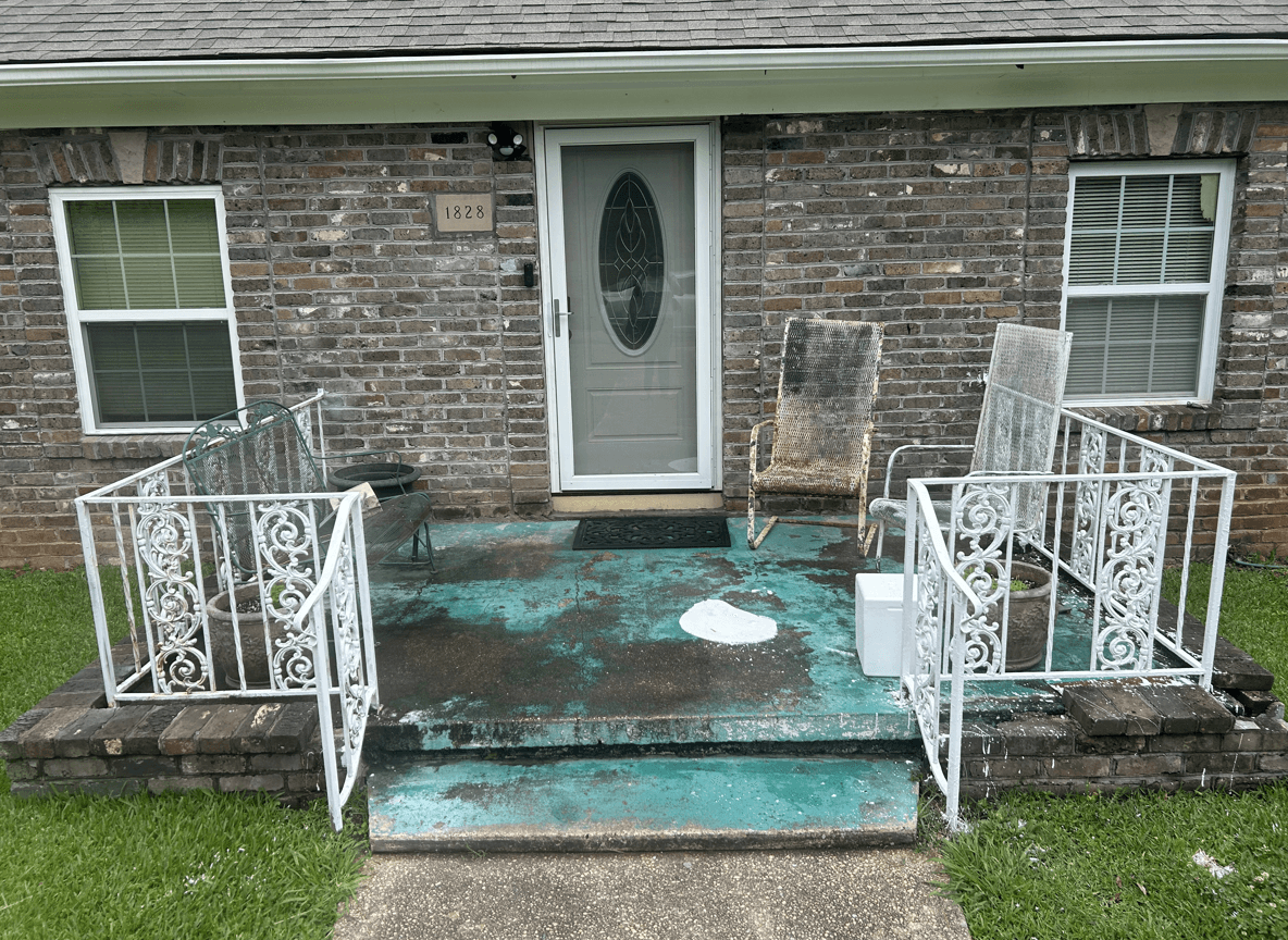 A porch with worn furniture and a stained floor, seeking improvement ideas.