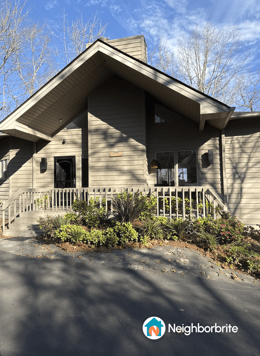Front yard with plants, seeking ideas for boulders and landscaping.
