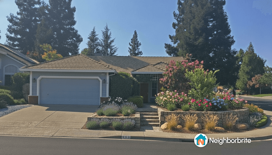 A beautiful home with landscaped yard and flowers.