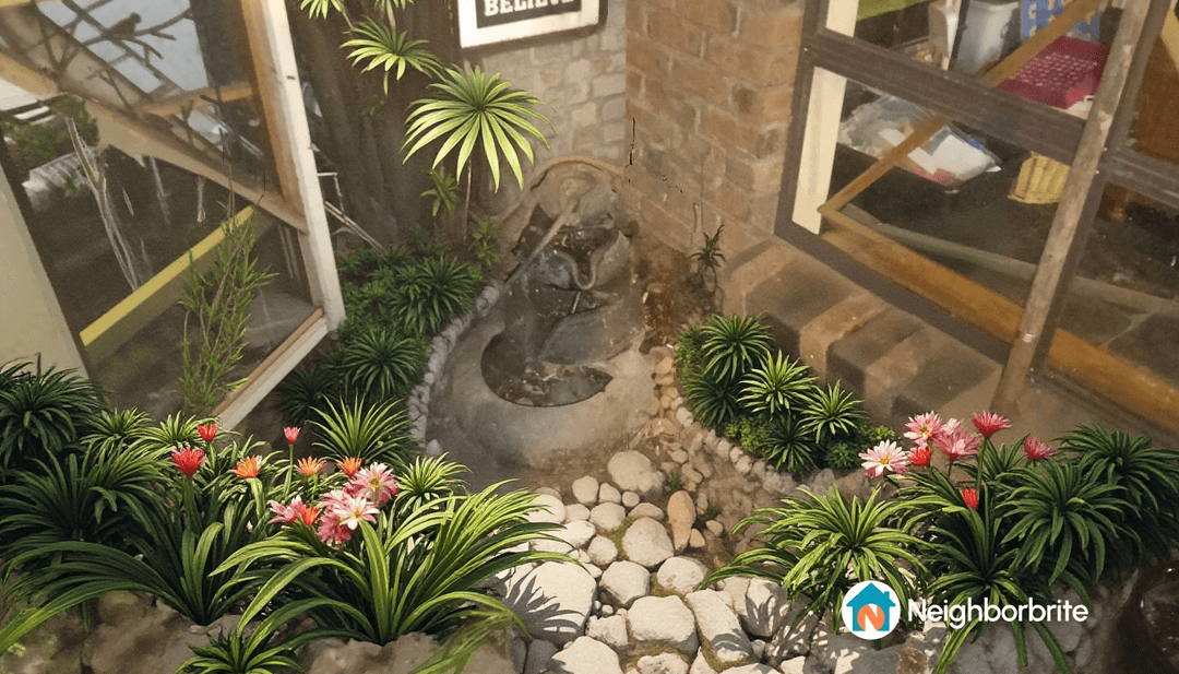 A garden scene with plants and a stone feature, expressing a desire for more height.